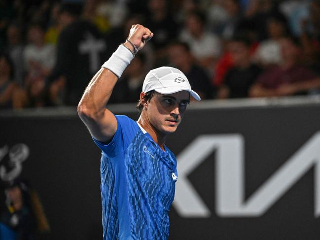 Australia's Adam Walton reacts after a point against France's Quentin Halys during their men's singles match on day one of the Australian Open tennis tournament in Melbourne on January 12, 2025. (Photo by Paul Crock / AFP) / -- IMAGE RESTRICTED TO EDITORIAL USE - STRICTLY NO COMMERCIAL USE --