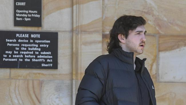 Mr Rigney leaving the Adelaide Magistrates Court in February last year. Picture: Roy VanDerVegt