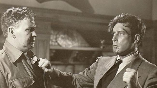 Lawrence Tierney (right) about to beat up Barton McLane in the 1946 film San Quentin.