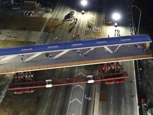 This March 10 photo shows the main span of the a pedestrian bridge as it was positioned in place just days before it collapsed. Picture: Pedro Portal/ The Miami Herald/AP