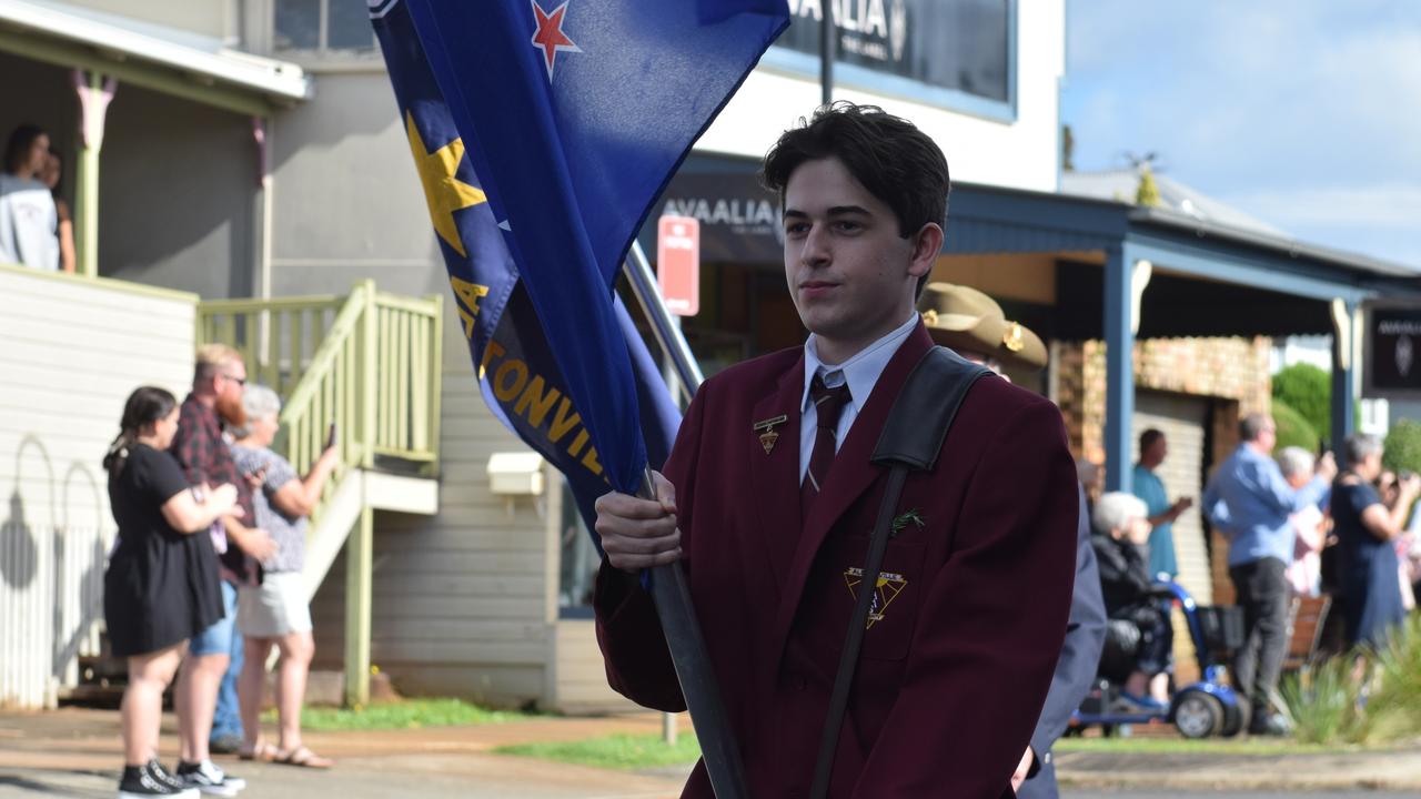 Alstonville High School represented the town holding aloft the official Alstonville flag alongside the marching band during the ANZAC DAY parade on Main Street in Alstonville Picture: Nicholas Rupolo.