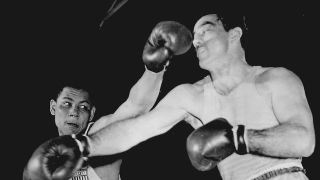 Laszlo Papp of Hungary (right) in action against American Jose Torres in the 1956 boxing final.