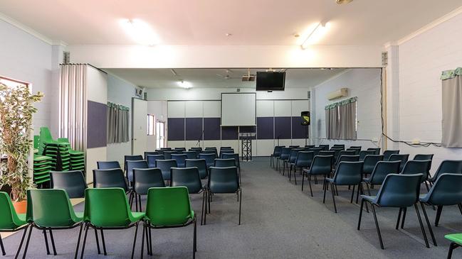 A school hall is one of its prominent features