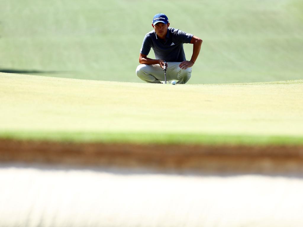 Collin Morikawa lines up a putt on the eighth green. Picture: Getty