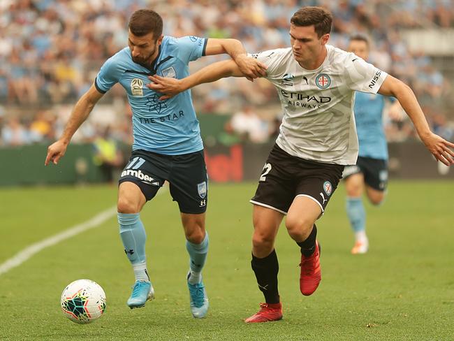 Kosta Barbarouses takes on Curtis Good. Picture: Getty Images