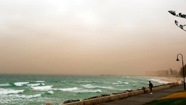 Smoke from the bushfires seen over Glenelg beach. Picture: James Rowson.