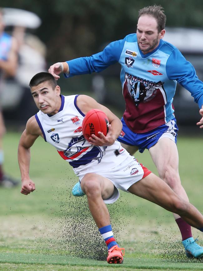Football BFL: Modewarre v Queenscliff. Modewarre 16 Jackson OÃ•Hanlon chases Queenscliff 57 Sol Bowtell Picture: Mark Wilson