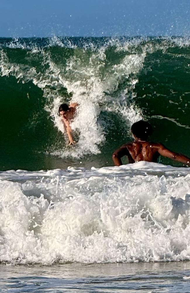 Board riders were being crunched in the big swell at Mooloolaba late Thursday afternoon as Tropical Cyclone Alfred hovered off the Qld coastline. Photo: Mark Furler