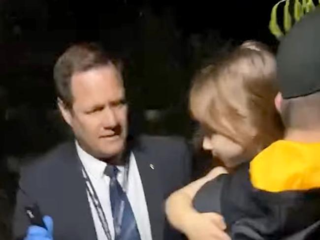 Officers carry Cleo Smith to safety. WA Police