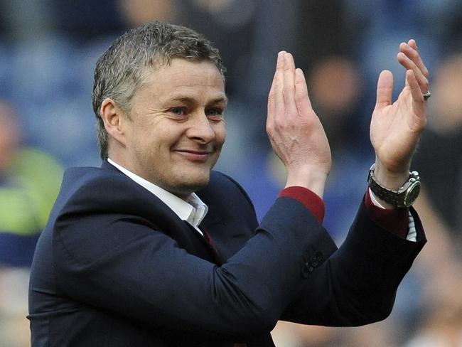 FILE - In this Saturday, March 29, 2014 file photo, Cardiff manager Ole Gunnar Solskjaer applauds fans after the English Premier League soccer match between West Bromwich Albion and Cardiff City at Hawthorns Stadium in West Bromwich, England. Manchester United announced Wednesday Dec. 19, 2018, they have hired Ole Gunnar Solskjaer as its manager until the end of the season, bringing the Norwegian back to the club 20 seasons after he scored its winning goal in the Champions League final. (AP Photo/Rui Vieira, File)