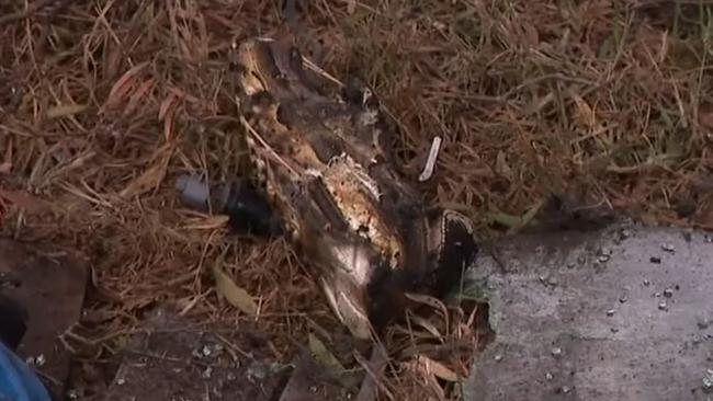 A burned shoe was seen at the crash site on Saturday morning. Picture: 9News
