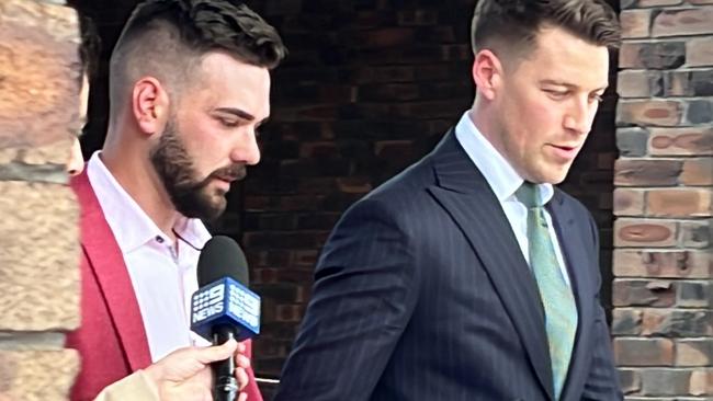 Sam Messina leaving Port Kembla Local Court on Tuesday alongside his lawyer Matt Ward. Picture: Dylan Arvela