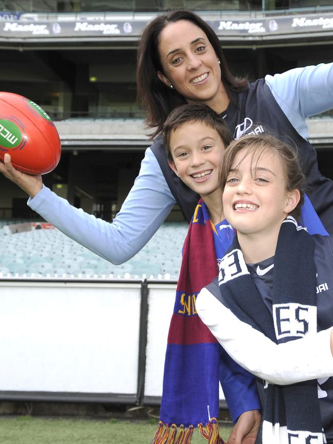 Nicole Livingstone with daughter Ella and son Josh at the MCG.