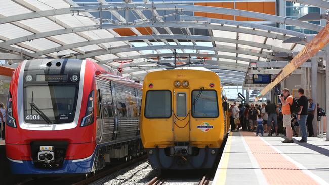 An electric train beside a diesel model at the Seaford station. Picture: Tait Schmaal