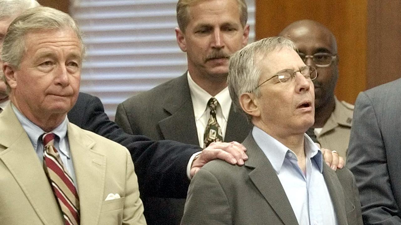 Eccentric millionaire Robert Durst stands with his lawyers in a Galveston court in 2003 after a jury found him not guilty of murdering and dismembering his neighbour Morris Black.