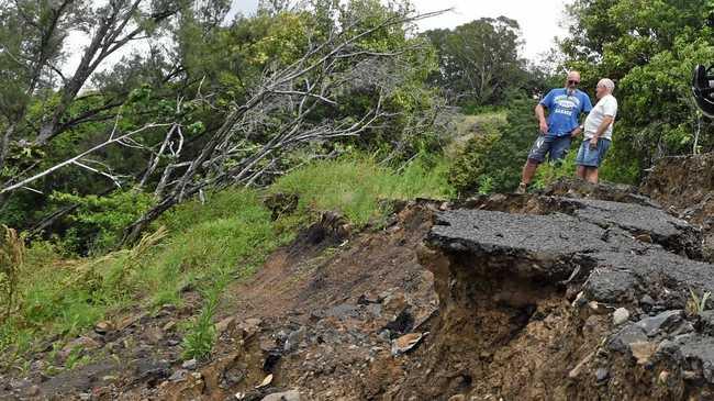 Concerned residents at Oakey Creek Road which is one of the many roads that need to be repaired in the region. Picture: Marc Stapelberg