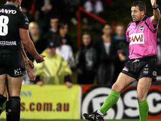 TIME FOR CHANGE: Referee Steve Lyons penalises and puts on report a Penrith player for a trip in a match in 2010. Picture: Matt King Getty Images