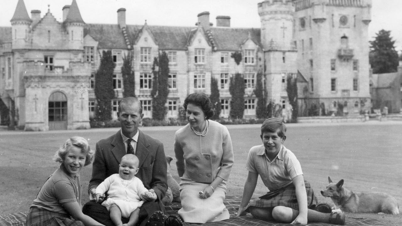 Queen Elizabeth II and Prince Philip, Duke of Edinburgh with their children, Prince Andrew (centre), Princess Anne (left) and Charles, Prince of Wales sitting on a picnic rug outside Balmoral Castle in Scotland. Picture: Keystone/Getty Images