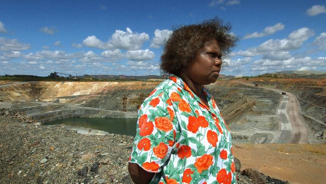 Senior traditional owner Yvonne Margarula of the Mirarr people stands in front of the Ranger uranium mine in Kakadu National Park.