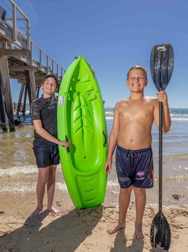 Thomas And Freddie Gough getting ready for a kayak. Picture: Ben Clarke/NCA Newswire