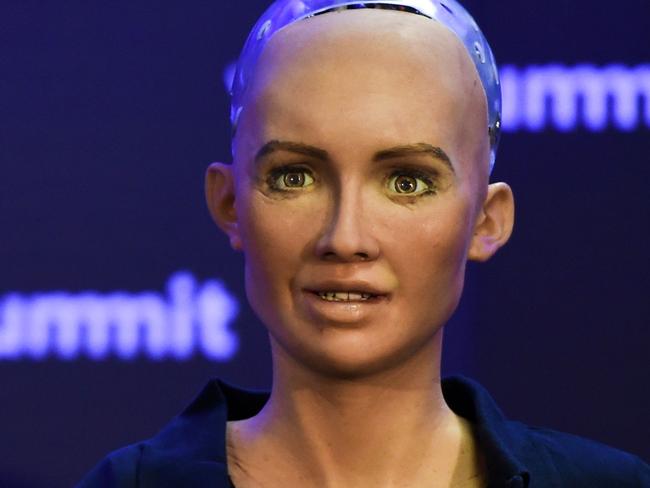 Humanoid "Sophia The Robot" of Hanson Robotics answers questions during a press conference at the 2017 Web Summit in Lisbon on November 7, 2017.  Europe's largest tech event Web Summit is held at Parque das Nacoes in Lisbon from November 6 to November 9.  / AFP PHOTO / PATRICIA DE MELO MOREIRA