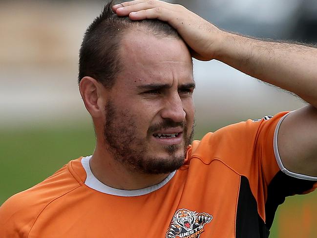 Wests Tigers train at Concord Oval ahead of their opening round game against the Roosters this weekend. New recruit Josh Reynolds on light duties at training. Picture: Toby Zerna