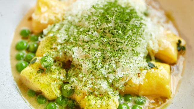 Saffron, ricotta and parmesan gnocchi with peas, tarragon, thyme and cultured butter from Transformer.