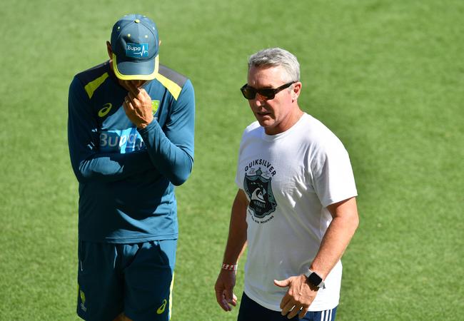 North Queensland Cowboys coach Paul Green (right) during an Australian Cricket team training session at the Gabba in Brisbane. 