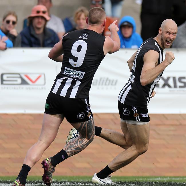 Wangaratta’s Callum Moore and Ben Reid celebrate a goal. Picture Yuri Kouzmin