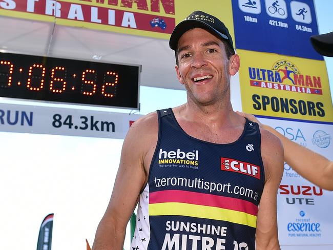 Ultraman Australia 2017 Champion Richard Thompson crosses the finish line at Noosa Main Beach in a World Best Ultraman time.