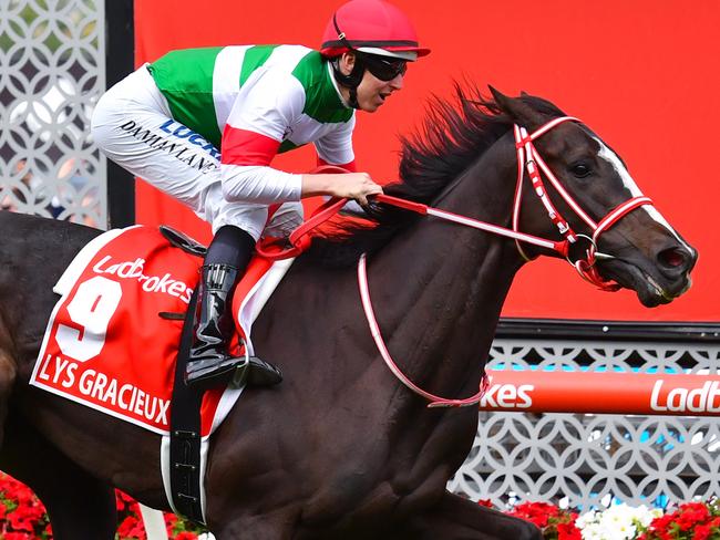 Jockey Damian Lane rides Lys Gracieux to victory in race 9, the Ladbrokes Cox Plate, during Cox Plate Day at Moonee Valley Racecourse, Melbourne, Saturday, October 26, 2019. (AAP Image/Vince Caligiuri) NO ARCHIVING, EDITORIAL USE ONLY