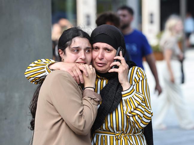 People are seen during the evacuation of the Fields shopping center in Copenhagen, Denmark, in a shooting that left several dead near a Harry Styles concert venue. Picture: AFP / Denmark OUT