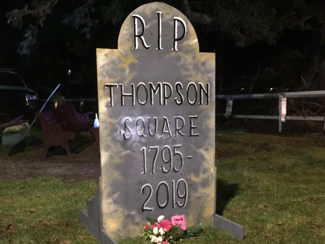 A headstone was placed in the square after the occupation ended.