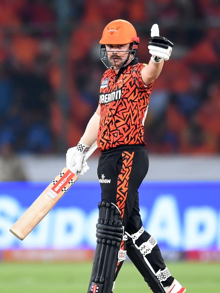 Sunrisers Hyderabad's Travis Head celebrates after scoring a half-century. Photo by Noah SEELAM / AFP.