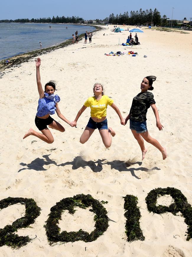 Chanel, 12, Bonita, 12, and Tayla, 12, at Altona beach earlier in the day. Picture: Nicole Garmston