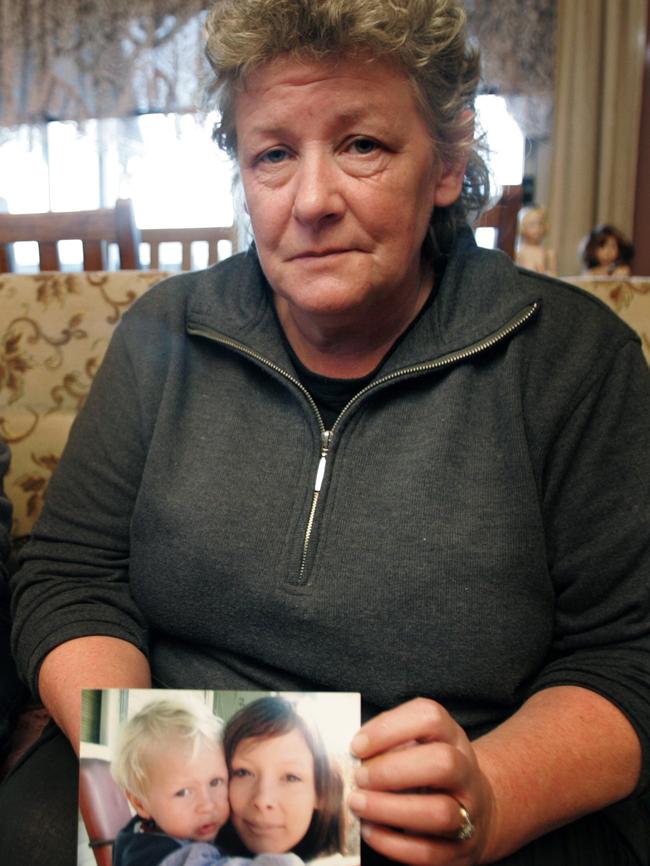 Helen’s mother Karel with a photo of her and Donovan after Helen went missing in 2008.