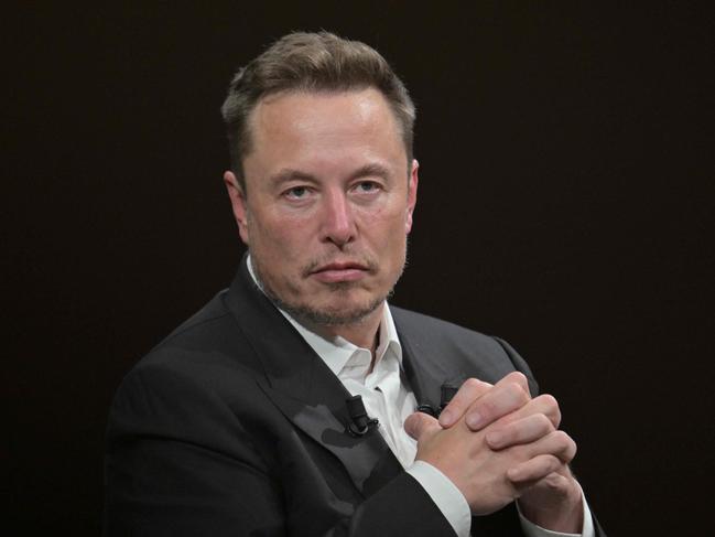 (FILES) SpaceX, Twitter and electric car maker Tesla CEO Elon Musk looks on as he speaks during his visit at the Vivatech technology startups and innovation fair at the Porte de Versailles exhibition center in Paris, on June 16, 2023. Musk, the owner of social media platform X, formerly Twitter, said the site is considering suing the Anti-Defamation League (ADL) over accusations of anti-Semitism, which he blames for falling revenue. Musk late on September 4, 2023, accused the US-based Jewish organization of making unfounded complaints against him and X that have scared away advertisers. (Photo by Alain JOCARD / AFP)