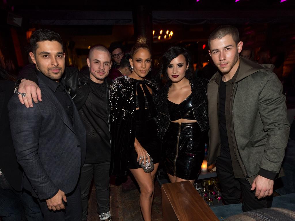 Wilmer Valderrama, Casper Smart,Jennifer Lopez, Demi Lovato and Nick Jonas attend Jennifer Lopez’s 2015 American Music Awards After Party on November 22, 2015 in Los Angeles, California. Picture: Getty