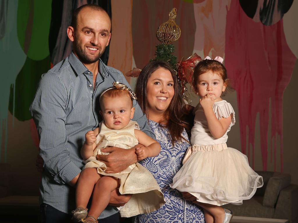 Nathan Lyon poses with Mel Waring and daughters Milla and Harper during the Australian Test Squad Christmas Day Luncheon at Crown Entertainment Complex on December 25, 2015. (Photo by Michael Dodge/Getty Images)