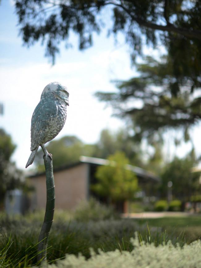 An owl pole sculpture at Stepney, before theft. Picture: Supplied