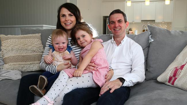 David Morgan furthered his education and therefore his career. Pictured at home with wife Jacquie and kids Olivia 4 and Eloise 1. Pics Adam Head