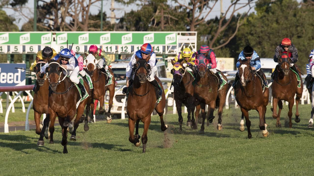 Seat of Power wins the Toowoomba Cup ridden by James Orman. Saturday, September 24, 2022. Picture: Nev Madsen.