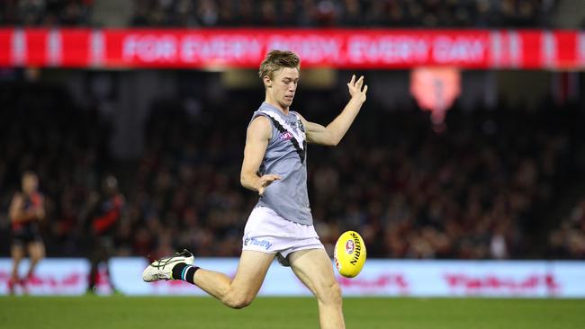 Todd Marshall of the Power kicks for goal during the round 20 win over Essendon. Pciture: Getty Images