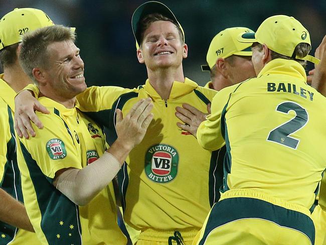 Teammates congratulate Steve Smith after his spectacular grab at the SCG.