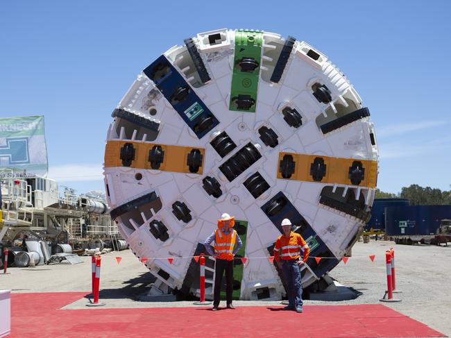 Transport and Main Roads Minister Mark Bailey and Cross River Rail Delivery Authority CEO Graeme Newton with a Tunnel Boring Machine. (News Corp/Attila Csaszar)