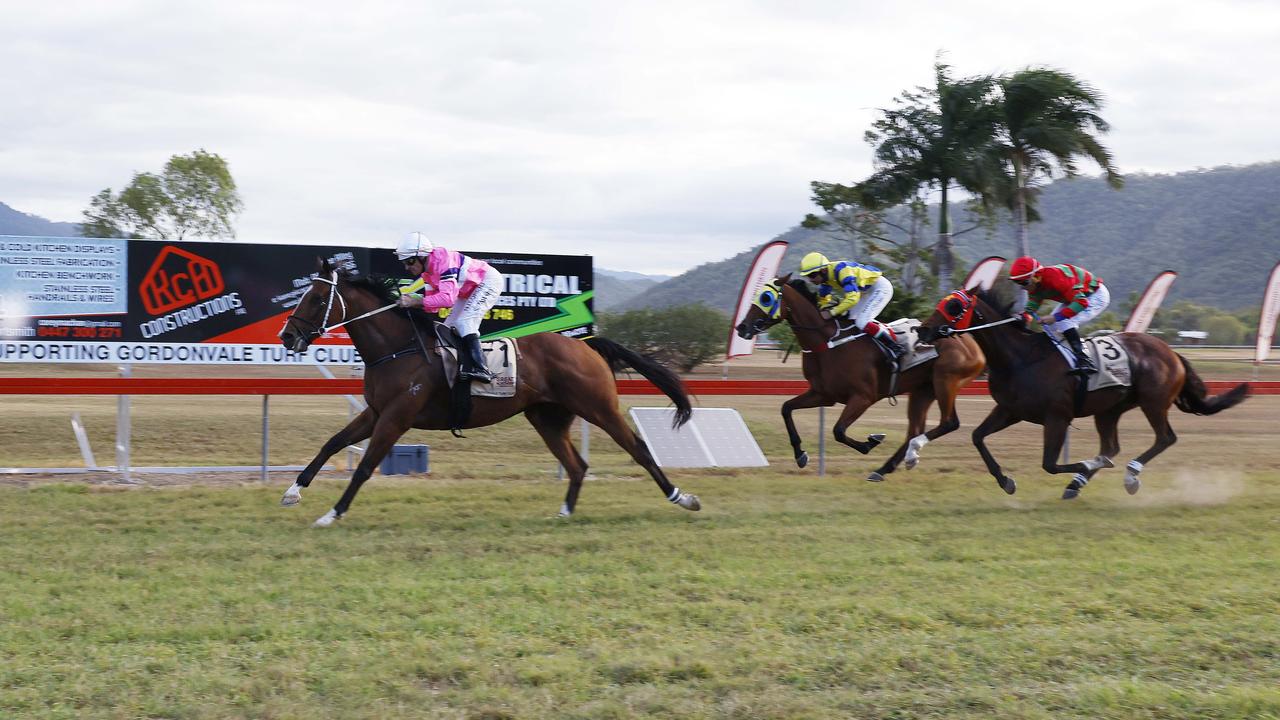 Fast Train, ridden by jockey Shane Pawsey, wins the Gordonvale Cup, held at the Gordonvale Turf Club. Picture: Brendan Radke