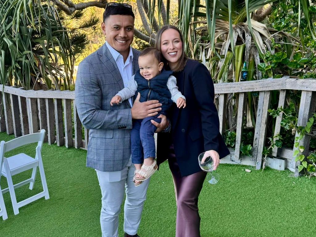 Wallabies centre Len Ikitau with son Lennox and fiancee Samantha De Flavis.