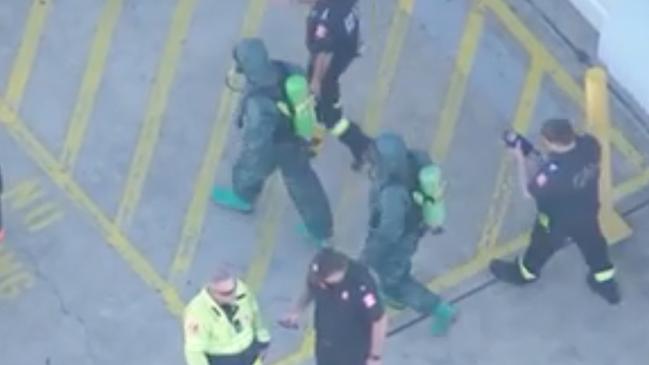 Emergency crews were seen entering the swim centre in head to toe hazmat gear. Picture: 7NEWS