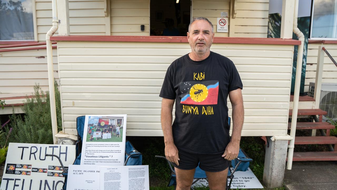 Indigenous activist and Kabi man Wit-boooka stands outside the Imbil Memorial Hall in opposition to the project. He says the government has no lawful authority over the land and the project is against his religious and spiritual beliefs. Picture: Christine Schindler