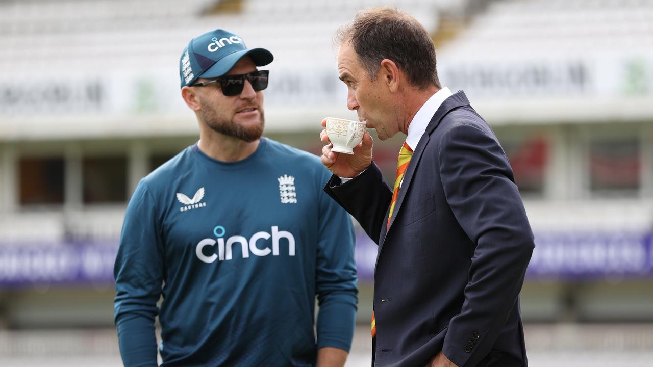 England Head Coach, Brendon McCullum speaking with Langer at an England training session in June.